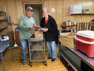 New Boston Community Center receiving a donation of meat from The Rancher's Table
