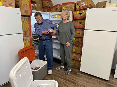 First Baptist Church accepting a meat donation from The Rancher's Table